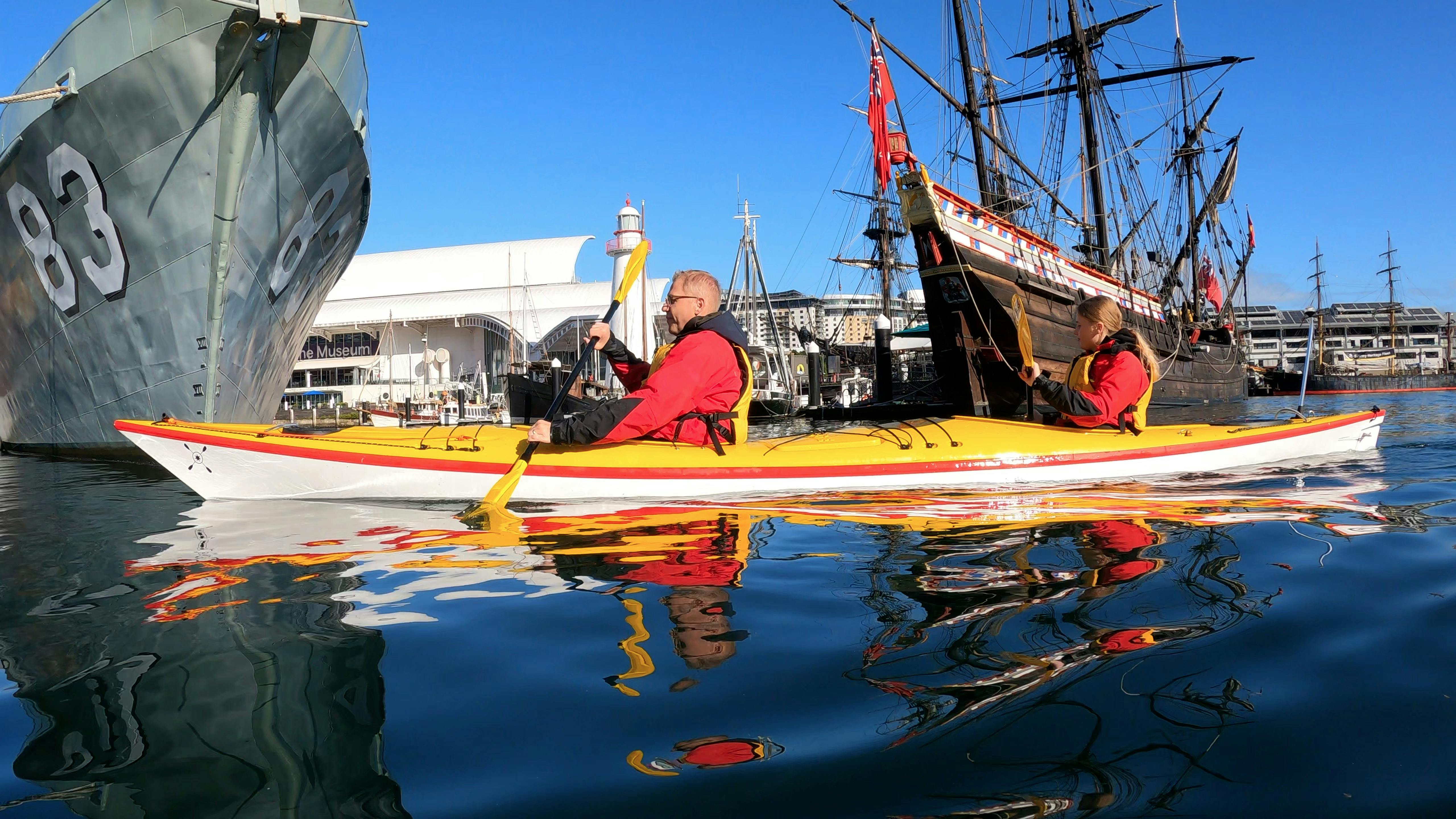 Paddle past historical tall ships and war ships