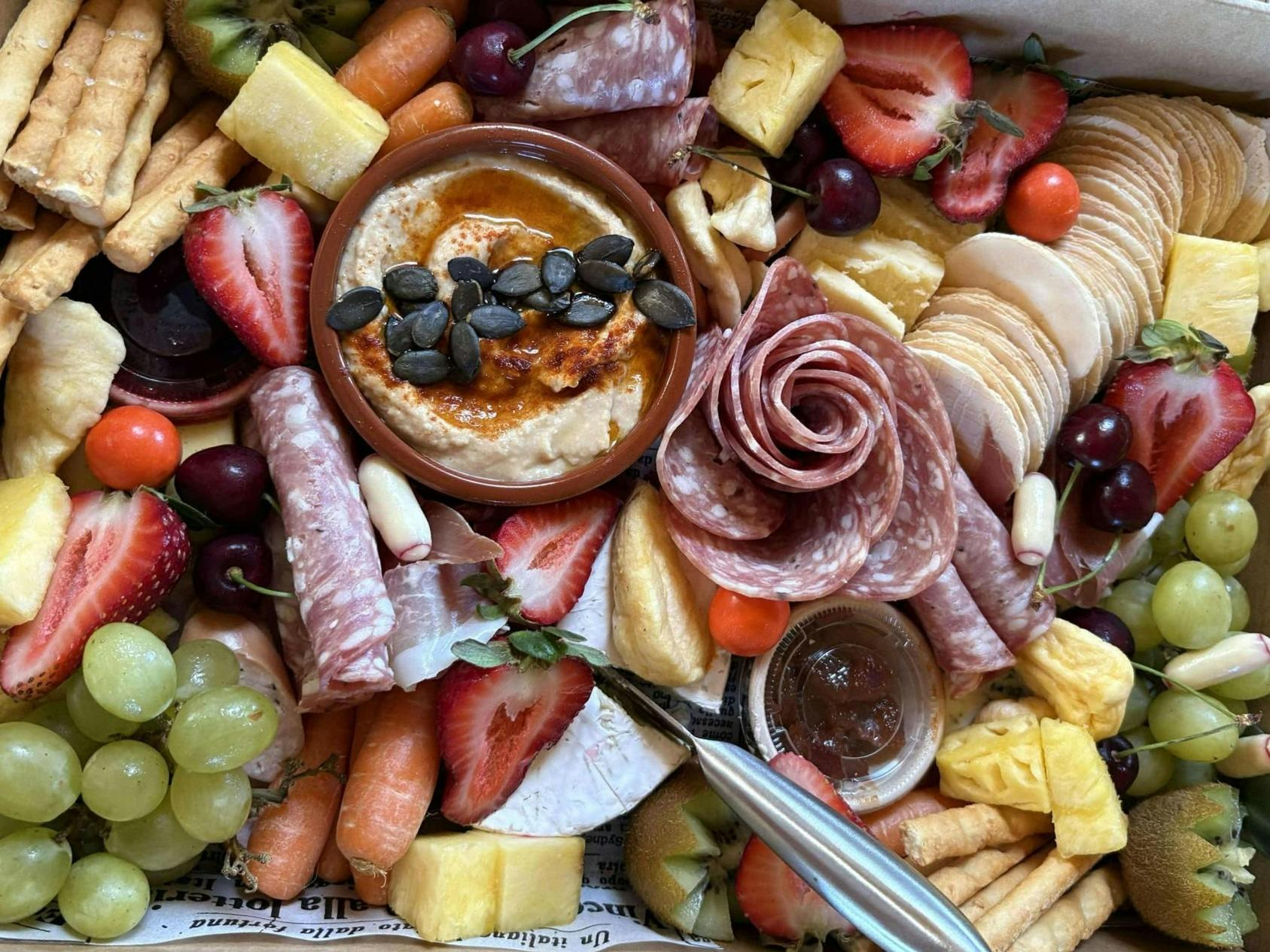 Savoury Charcuterie Grazing Box with artisan cheeses and meats. Available to order online.