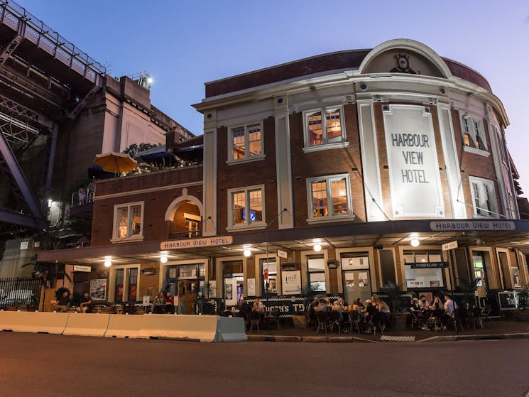 The exterior of the hotel at dusk