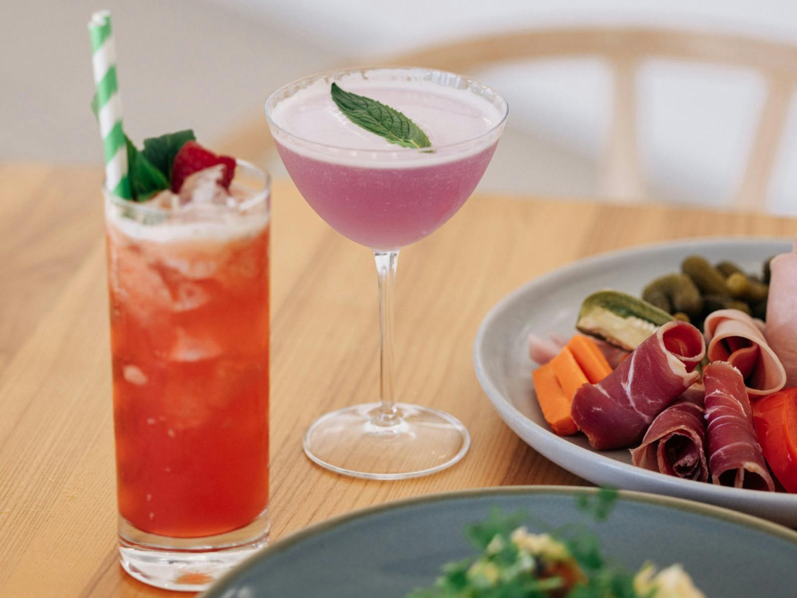 Vibrant Cocktails on Wooden Table