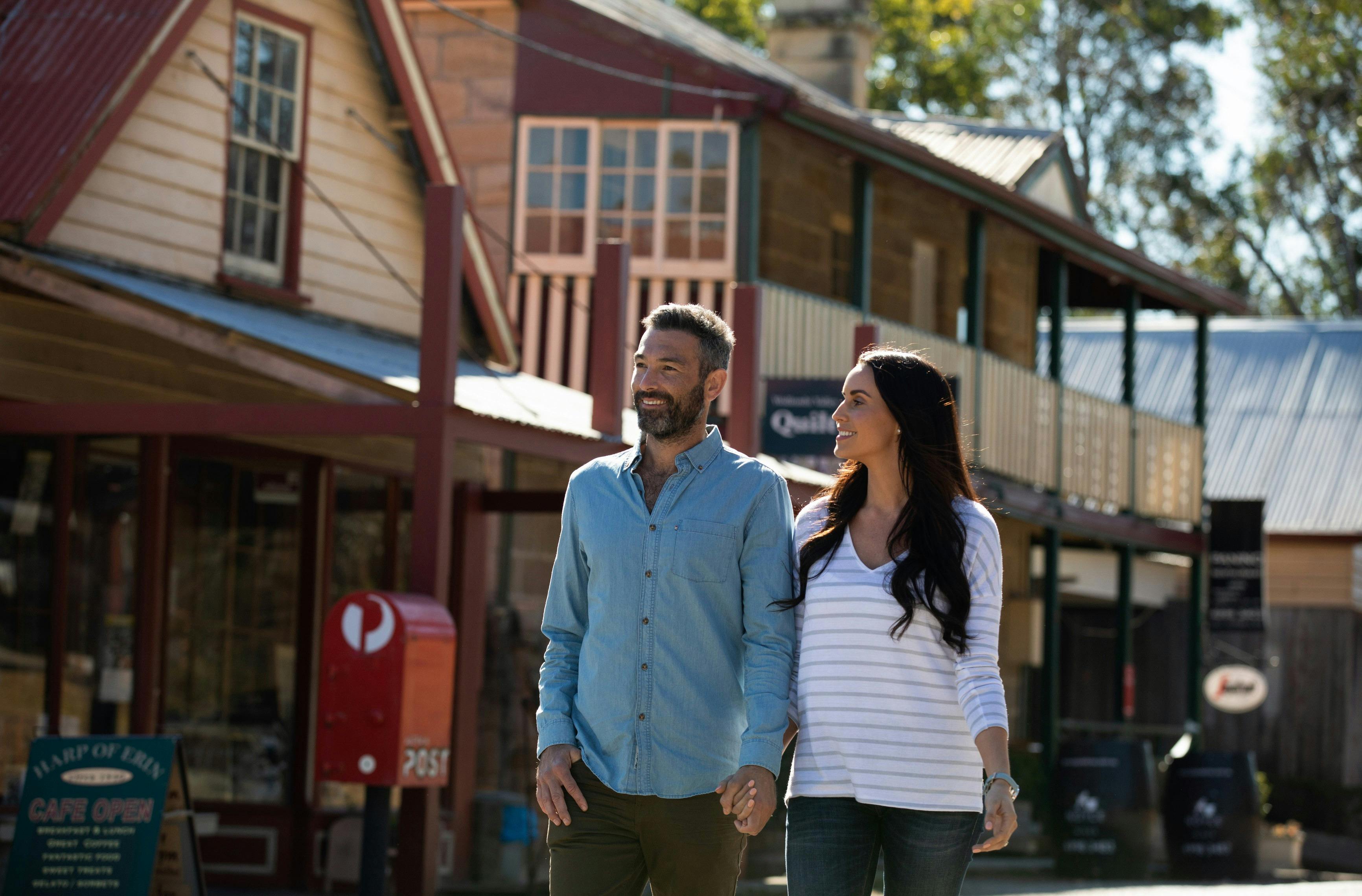 Couple Walking along the street at Wollombi