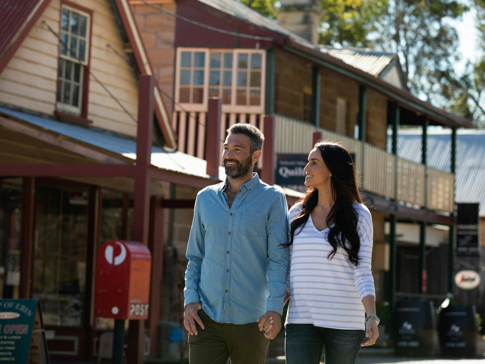 Couple Walking along the street at Wollombi