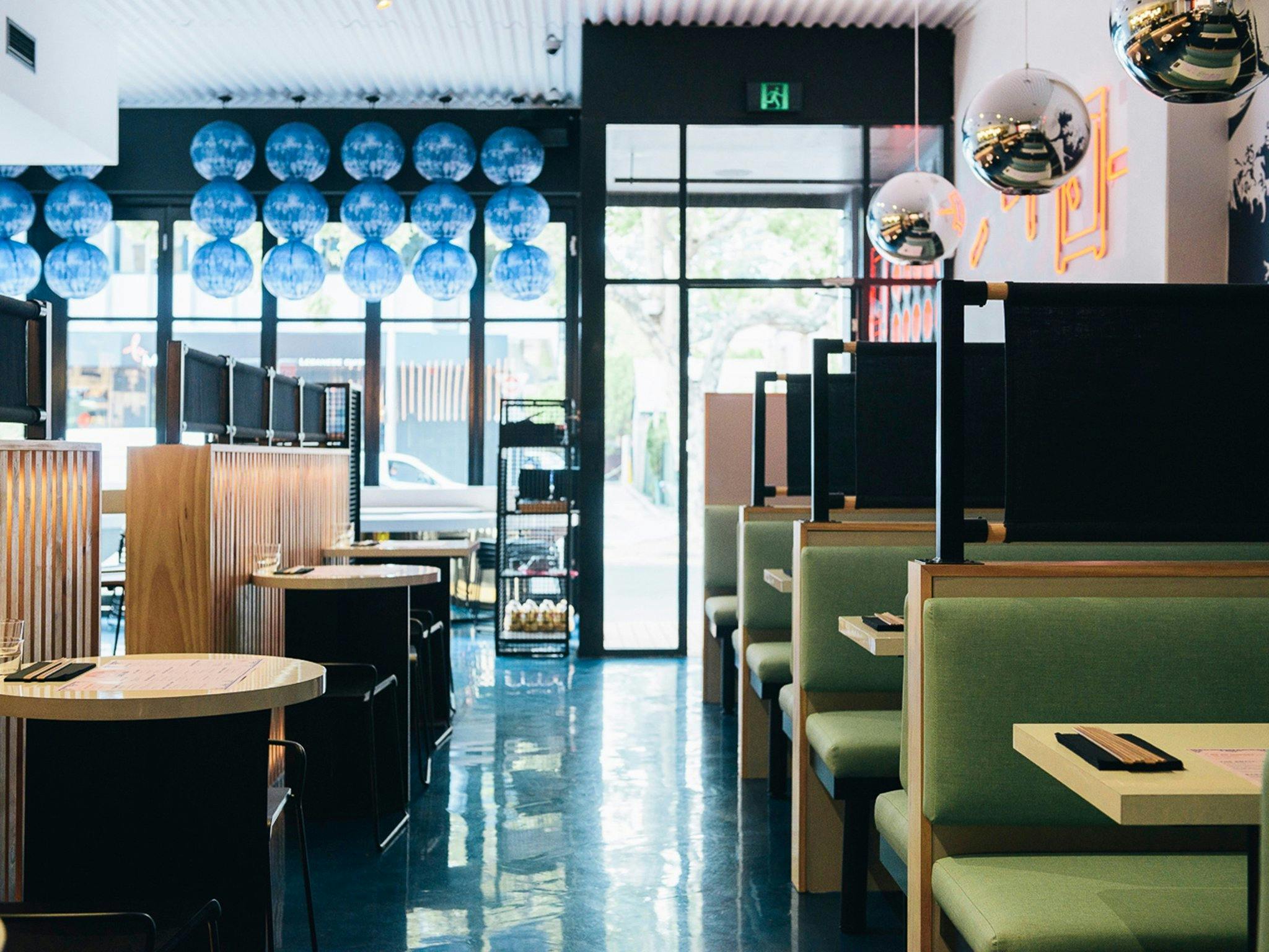 Well lit restaurant interior during the day