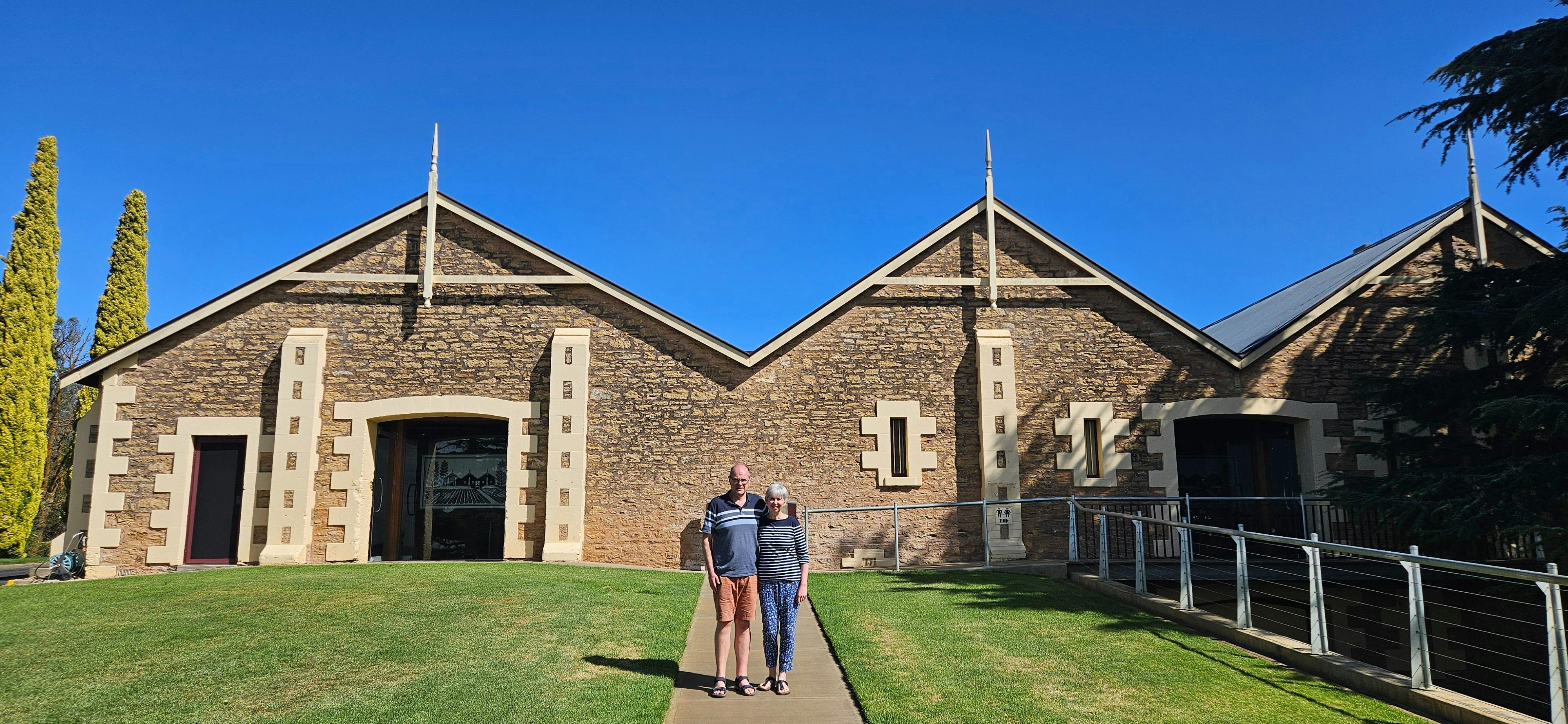 Coonawarra Experiences - two people posing outside Wynns Coonawarra