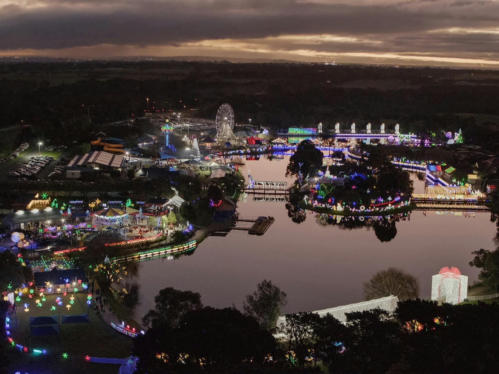 an aerial shot of the christmas lights