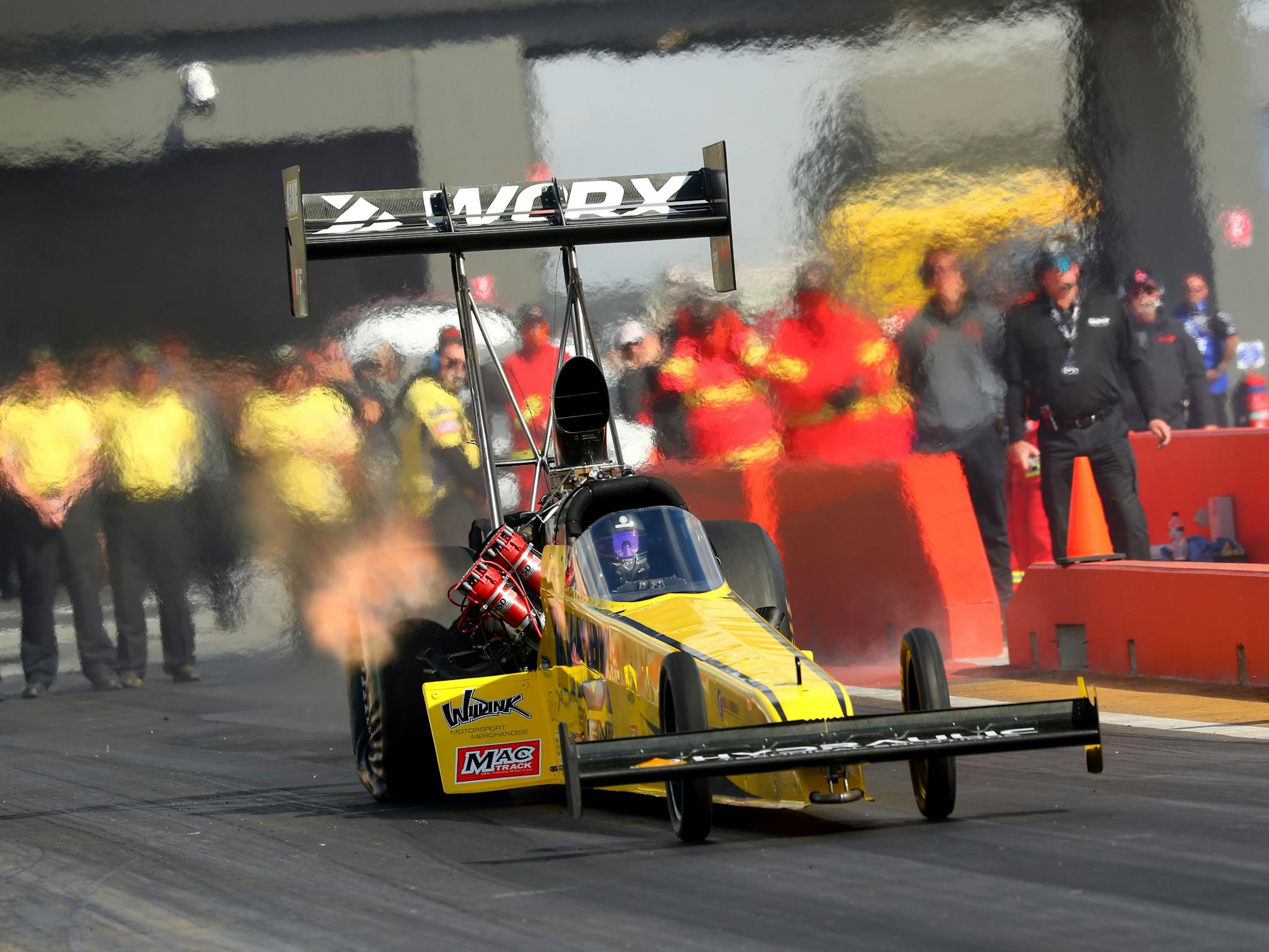 Top Fuel dragster launching