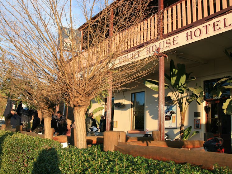 Hotel frontage with large spacious deck for eating or drinking and relaxing, dogs welcome.