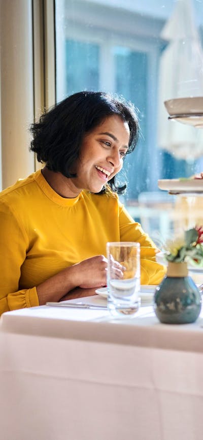 Mother and young daughter enjoying high tea at Parliament House