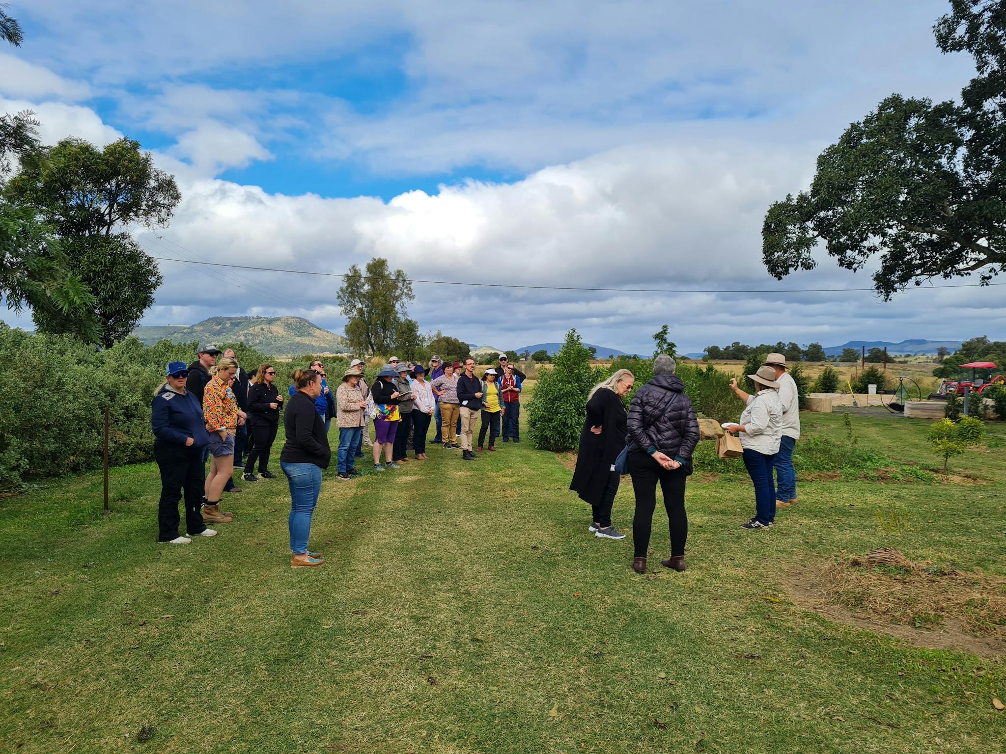 A tour group listening to founders extensive cultural knowledge A tour group listening to founders extensive cultural knowledge
