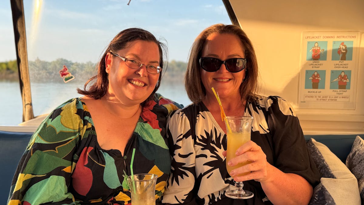 Guests making memories and taking pictures in the golden hour light