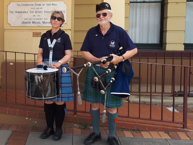 Members of the Glen Innes Pipe Band outside the Glen Innes Town Hall