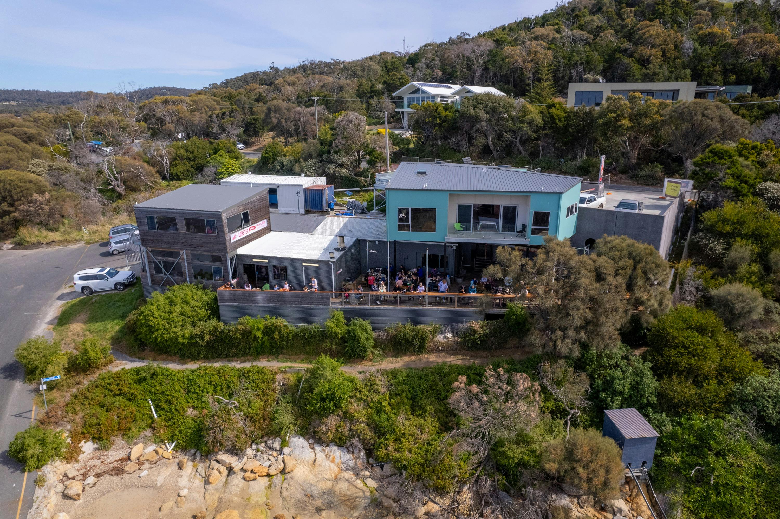Aerial shot of the Lobster Shack Tasmania building showing the outdoor deck