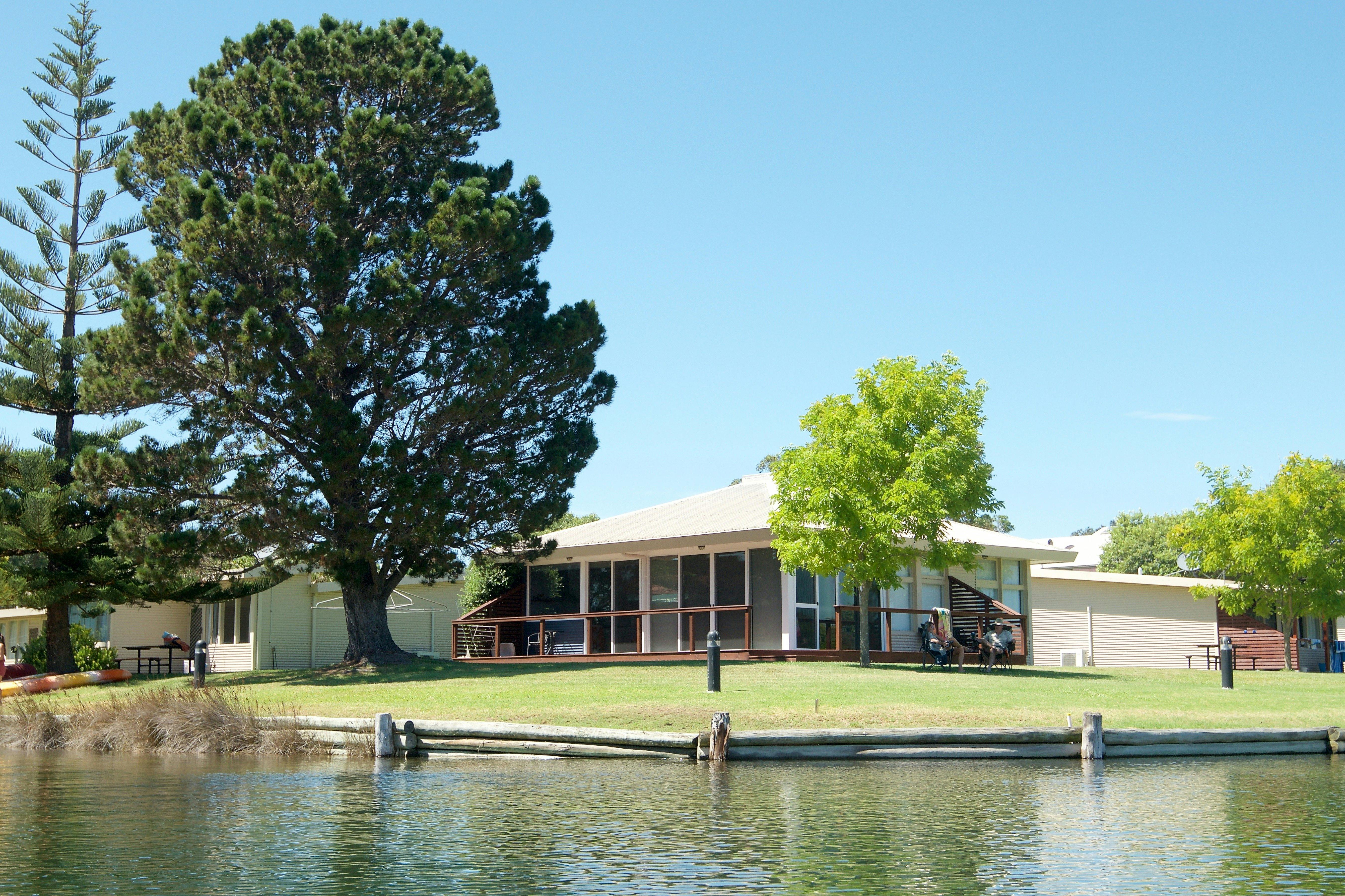 The Deluxe cottage is located on corner of resort has water views from all windows