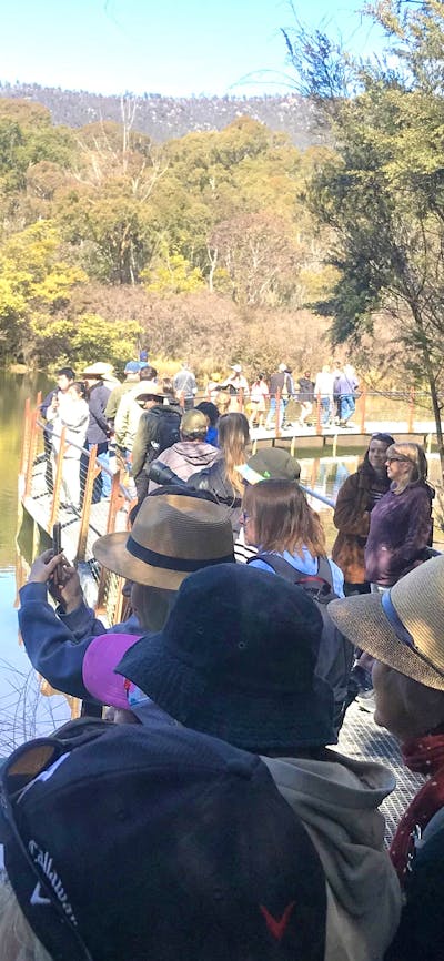 A group of people on a guided platypus walk