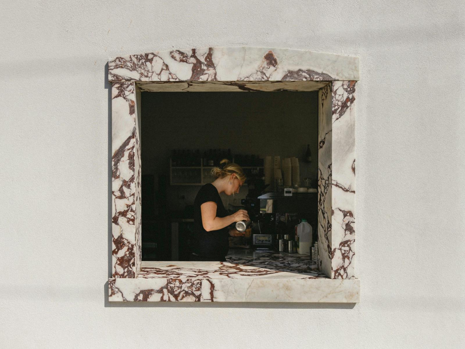 takeaway marble coffee window with barista