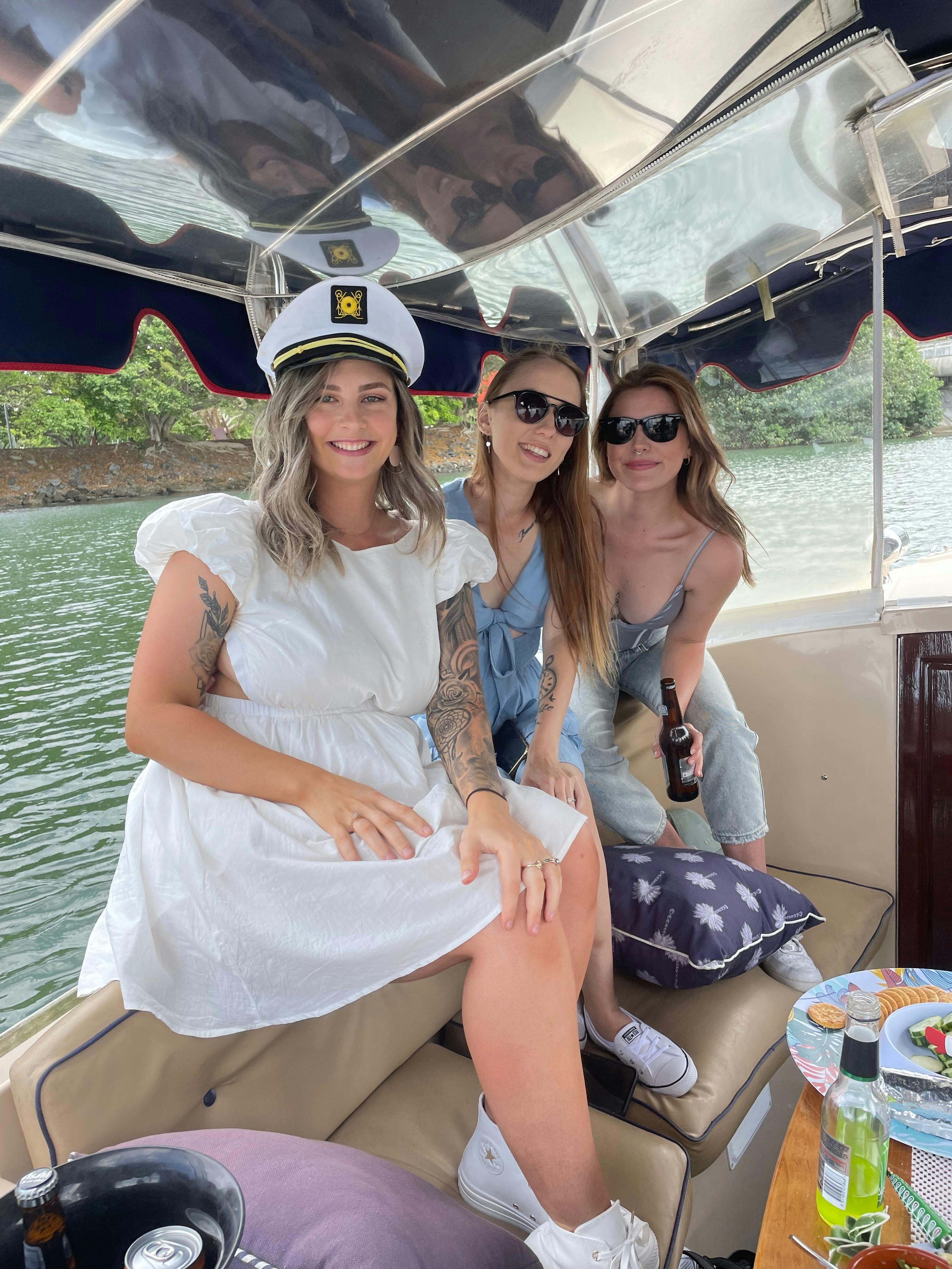 Hen's Gathering, 3 ladies onboard a Duffy Boat