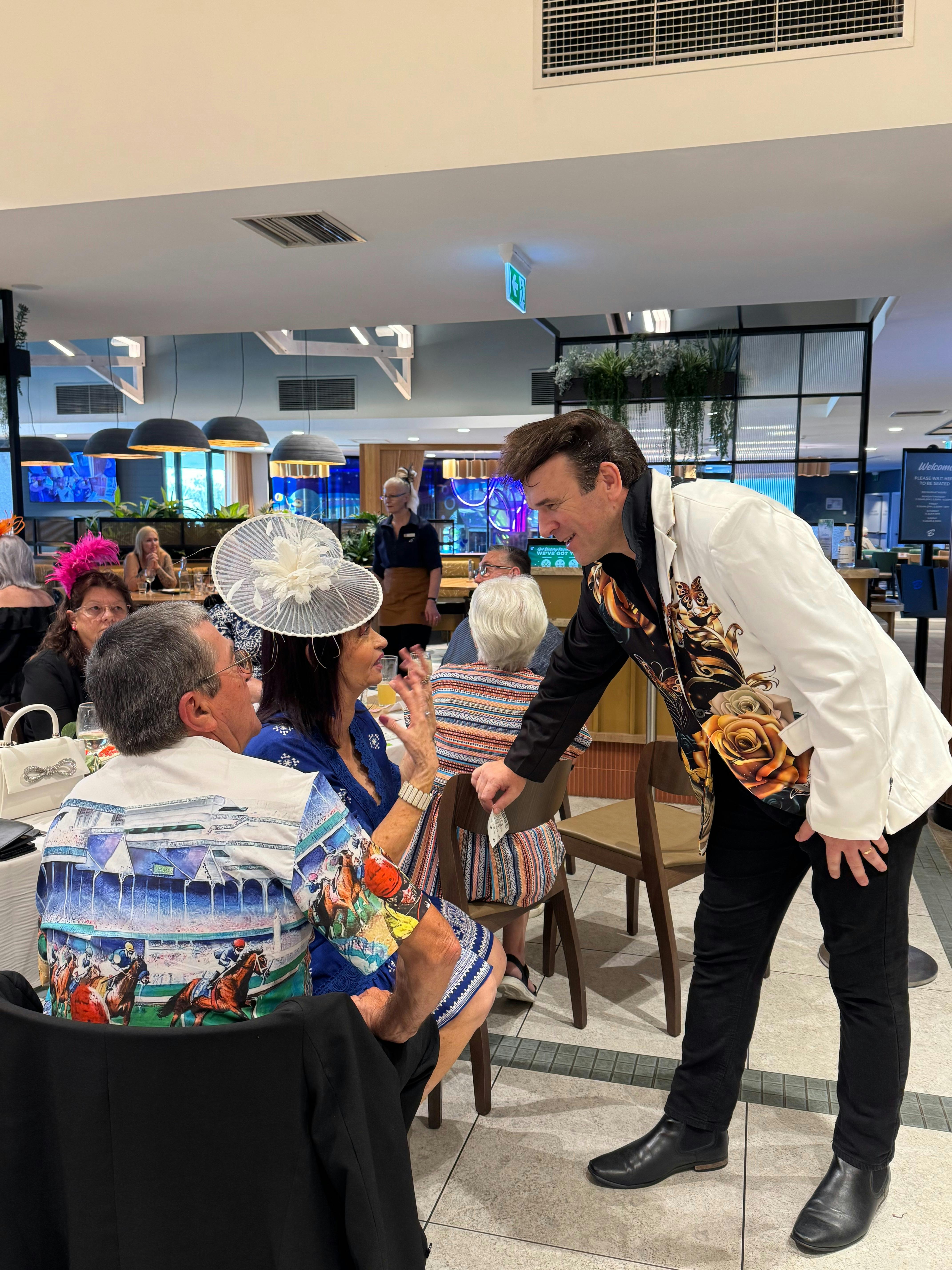Tommy Memphis talking to patrons