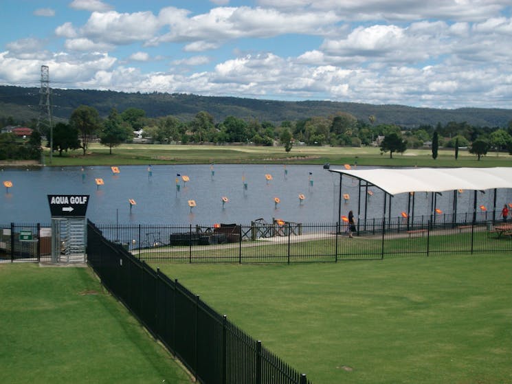 Aqua Golf lake with targets and end of hitting bay