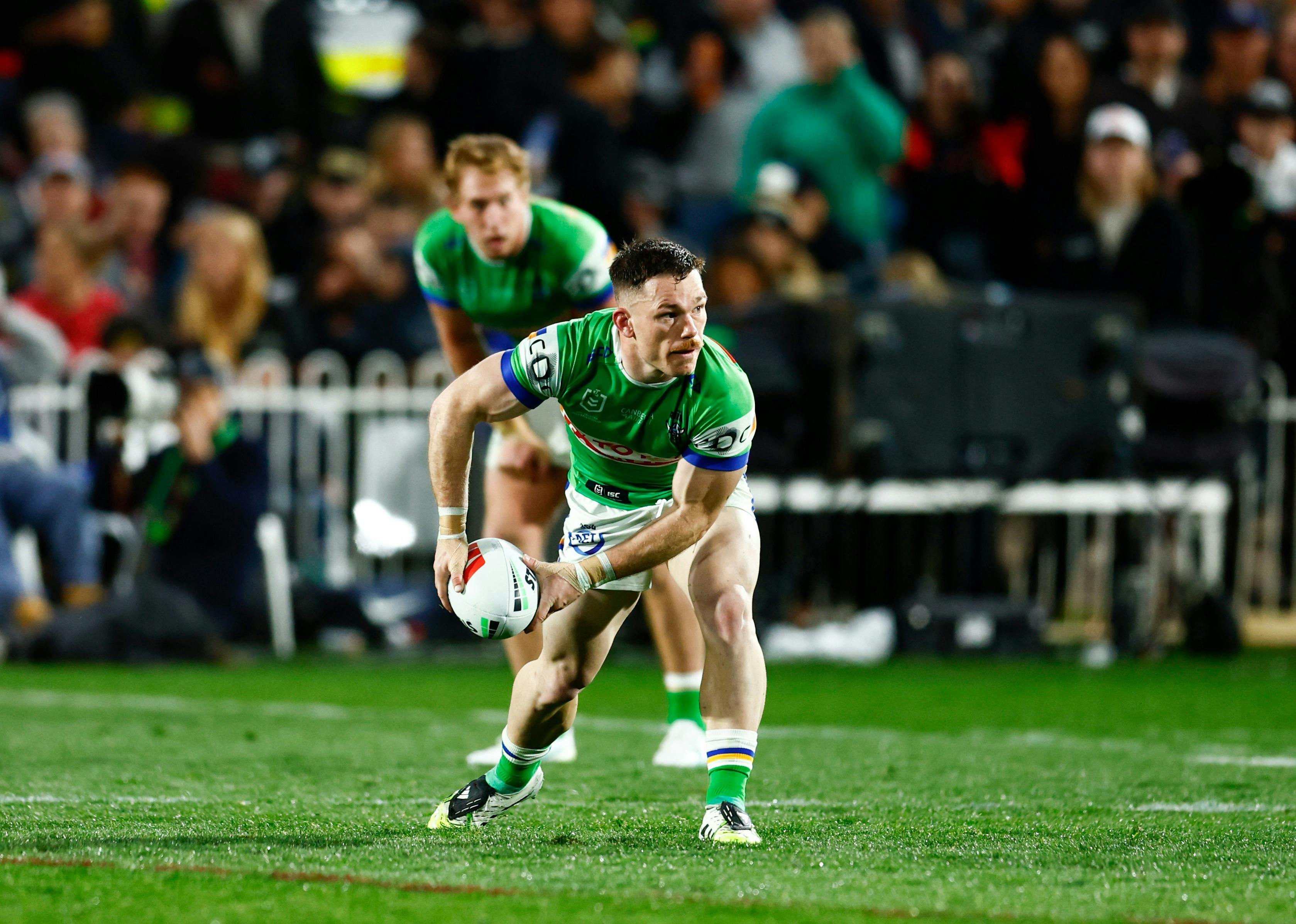 Canberra Raiders player Tom Starling passing the ball.