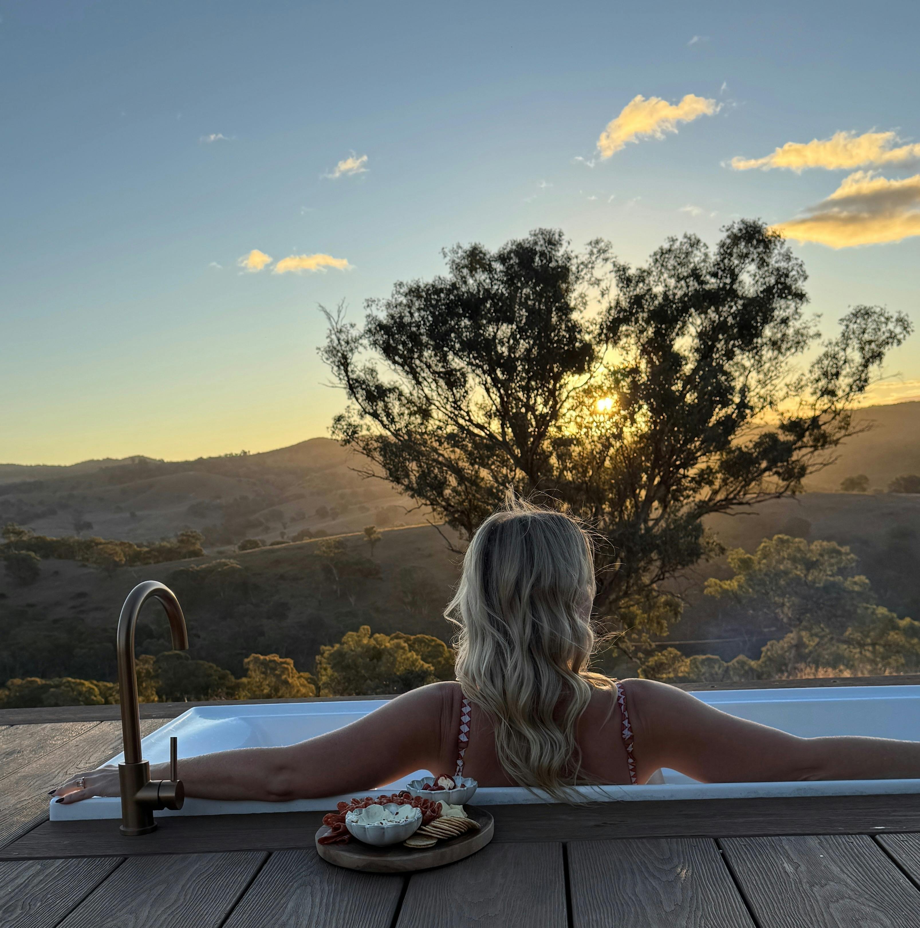 Guest enjoying outdoor bath