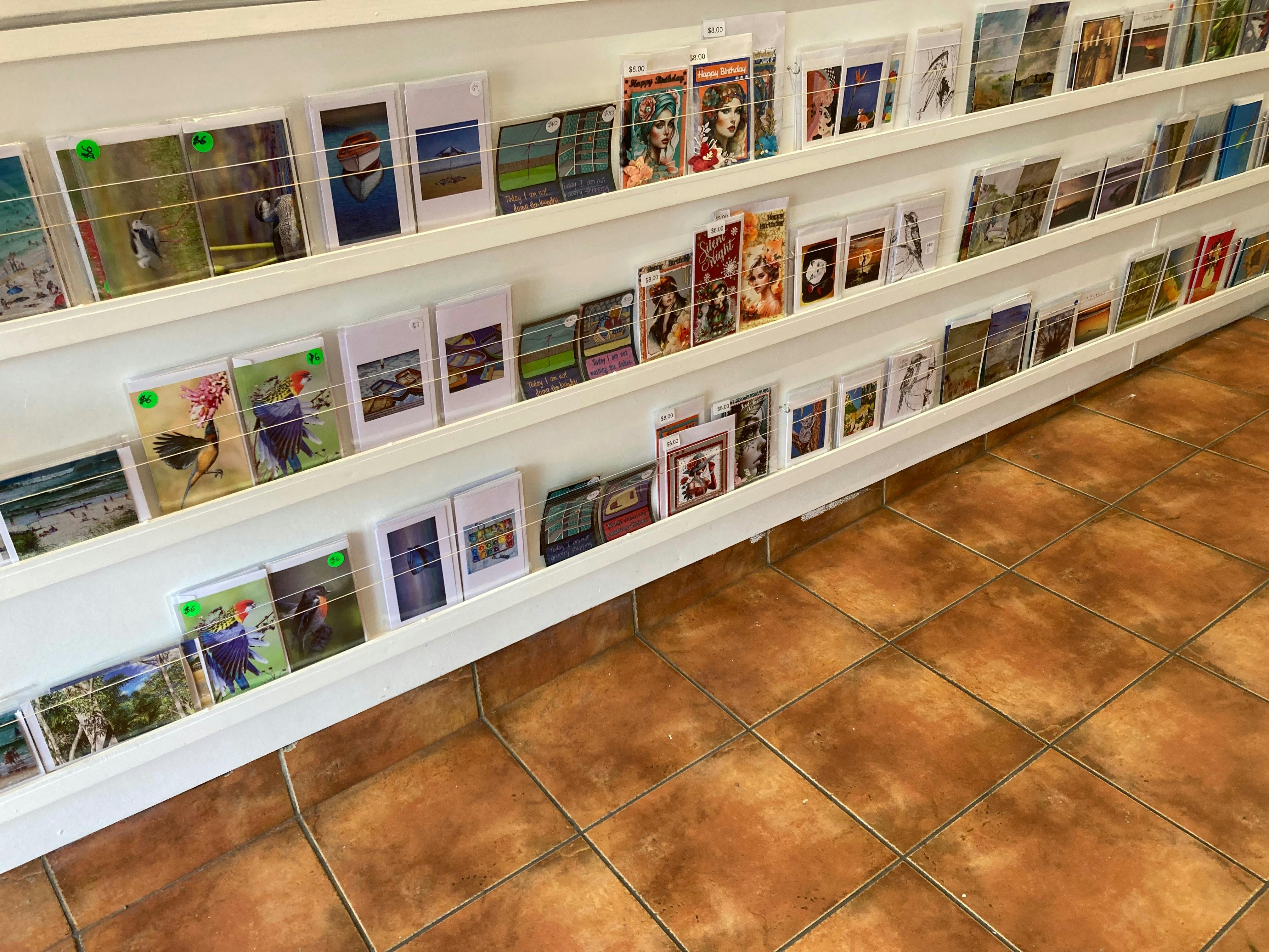 All cards are designed and produced by our local artists