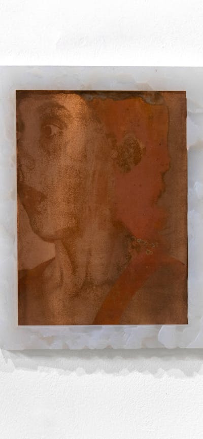 portirat of a suprised face made from copper and silicon