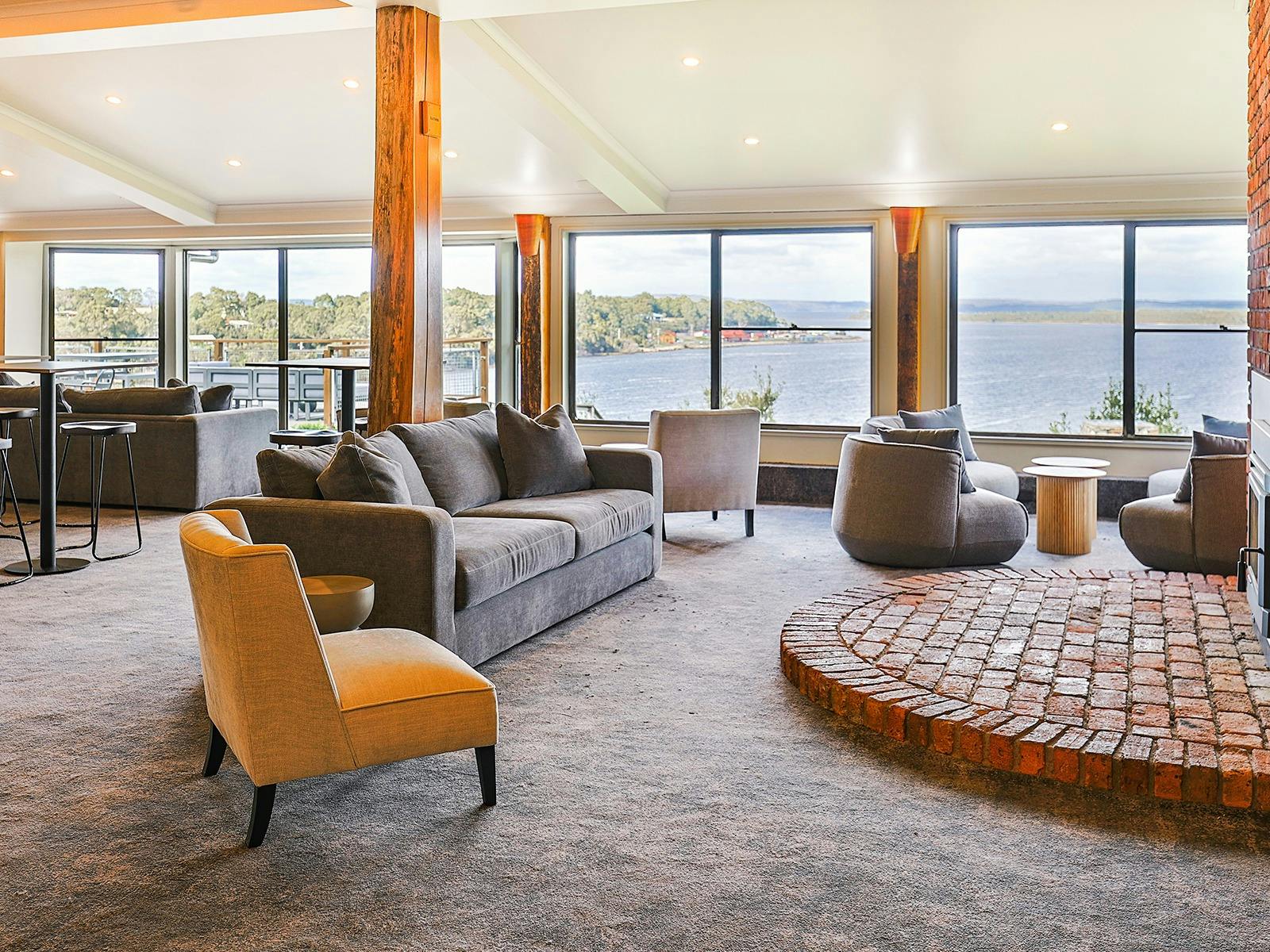 View 42 Restaurant & Bar | Lounge seating in front of fireplace