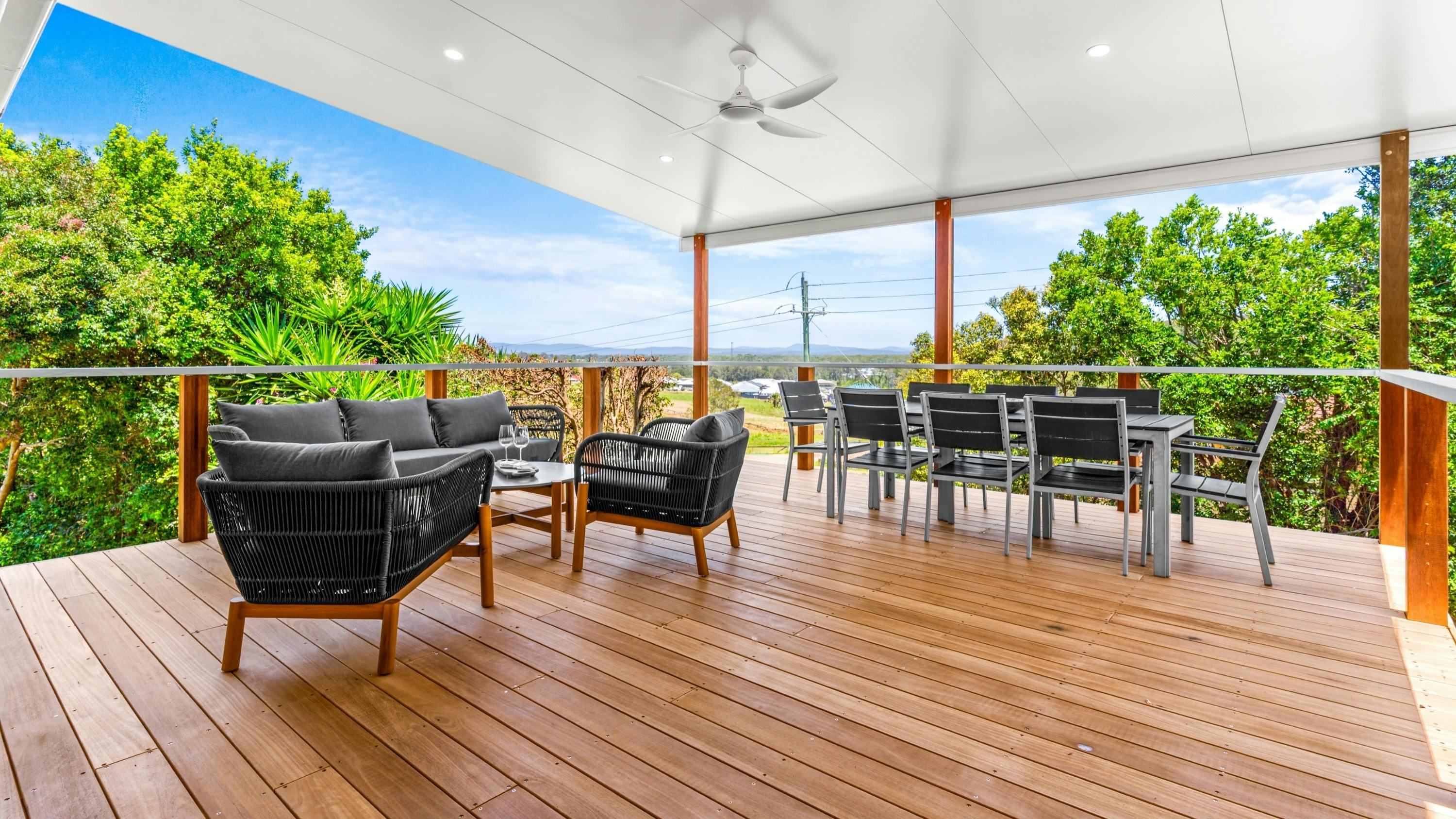 Deck with lounge and dining settings