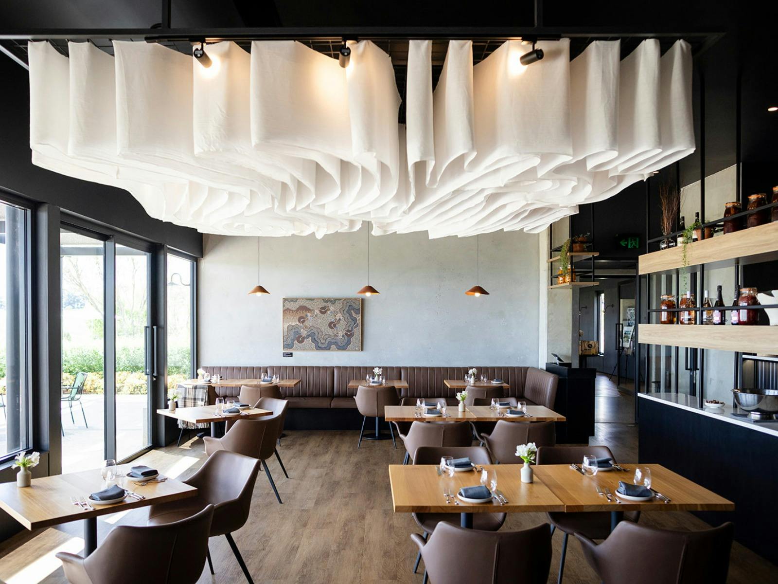 Printhie Dining interiori showing floor to ceiling windows