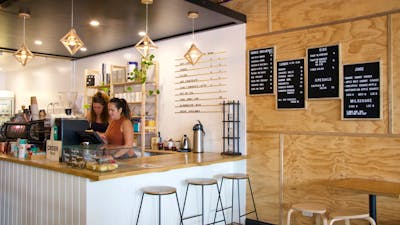 Trader & Co front counter and drinks, breakfast, lunch, all-day and kids menu display