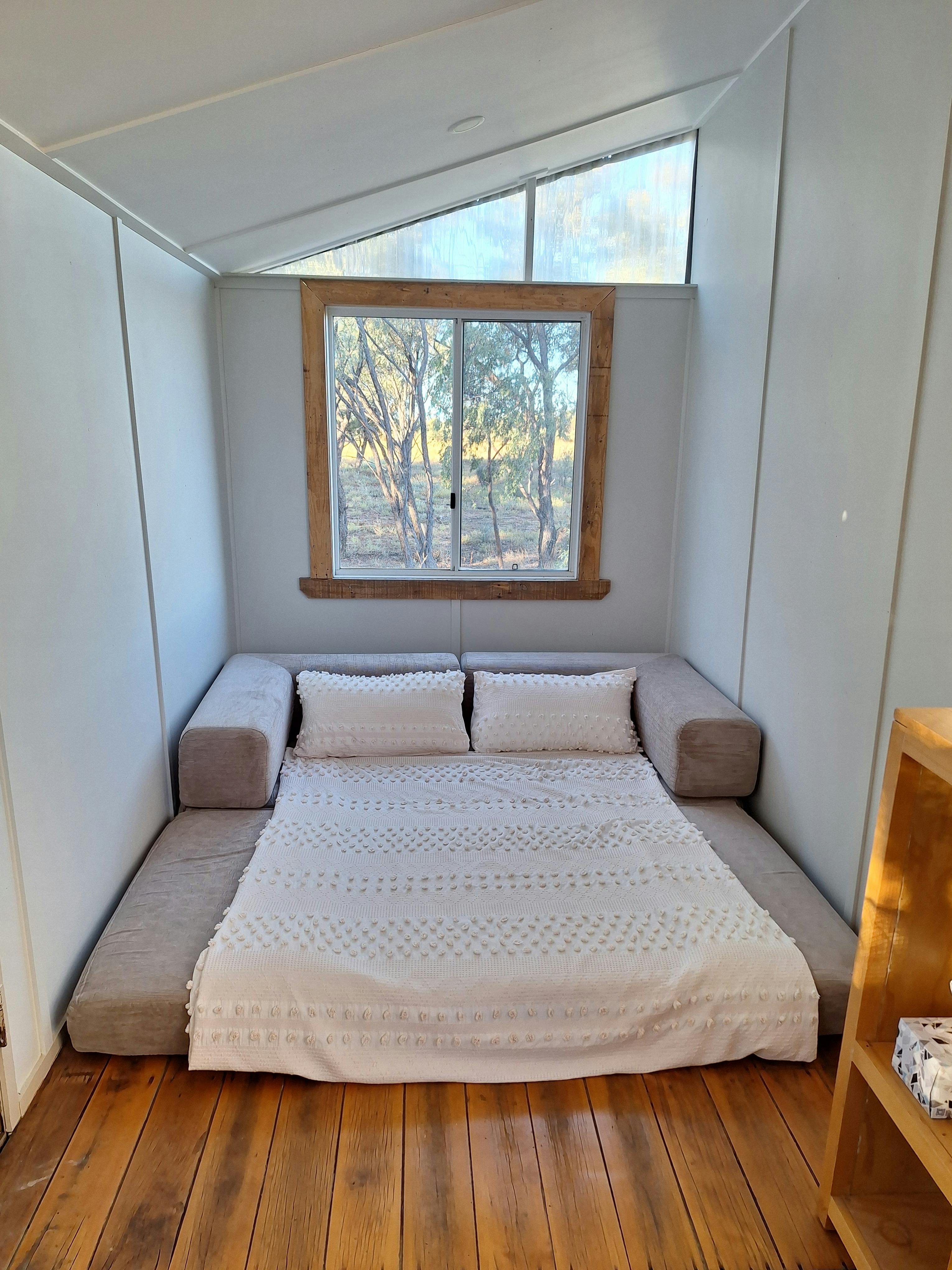 A double sofa bed folded out
