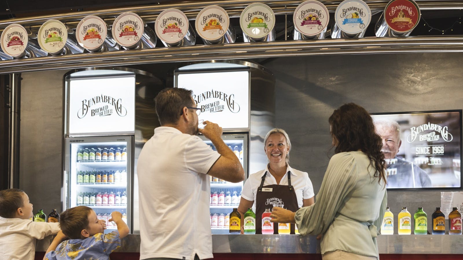 A family samples the full Bundaberg Brewed Drinks range – smiles all around! A family samples the full Bundaberg Brewed Drinks range – smiles all around!