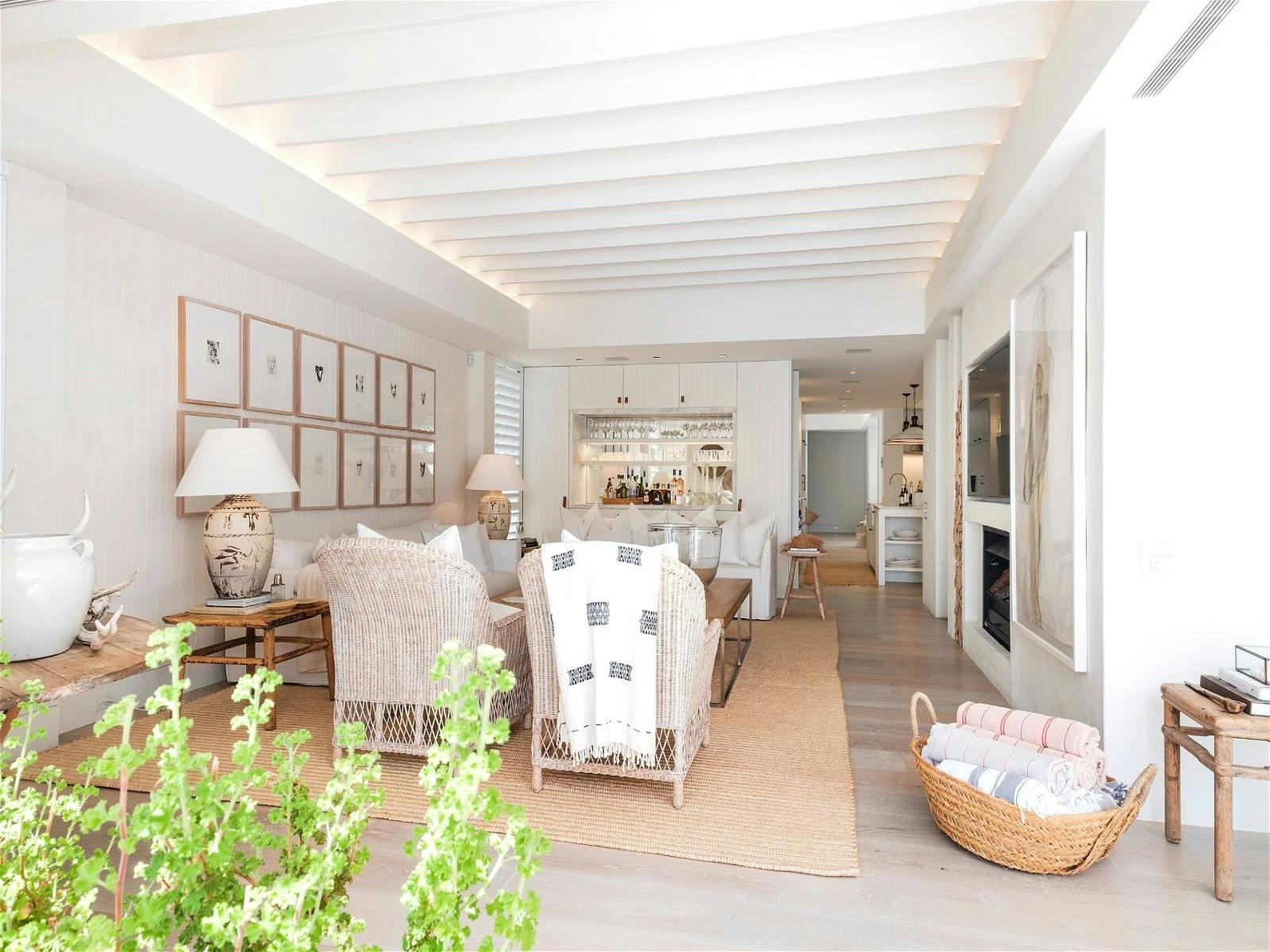 A crisp white colour palette paired with timber touches integrates seamlessly