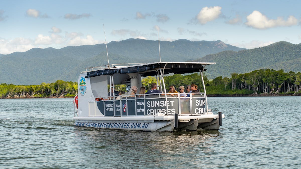 The Fitzroy One Cairns River Cruise with guests aboard sailing into the Trinity Inlet near Cairns