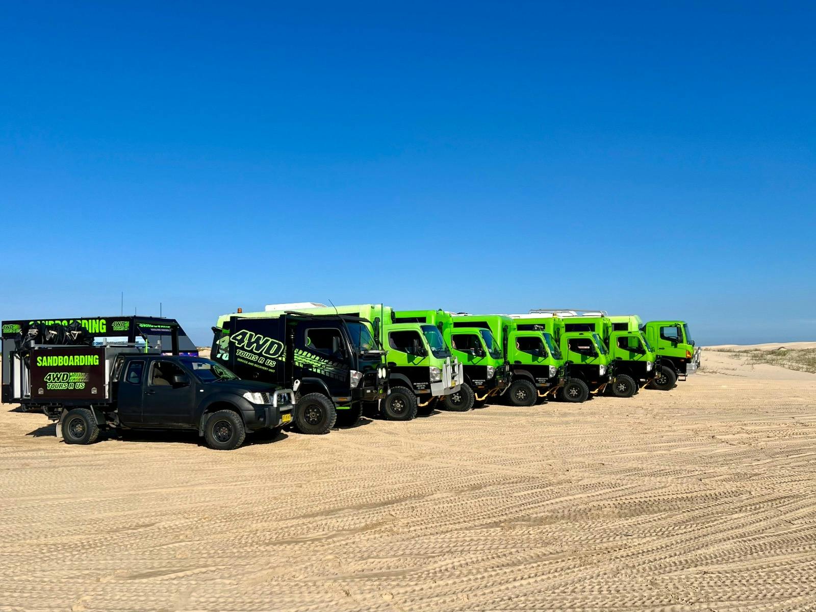 The 4WD Tours r Us fleet of buses lined up