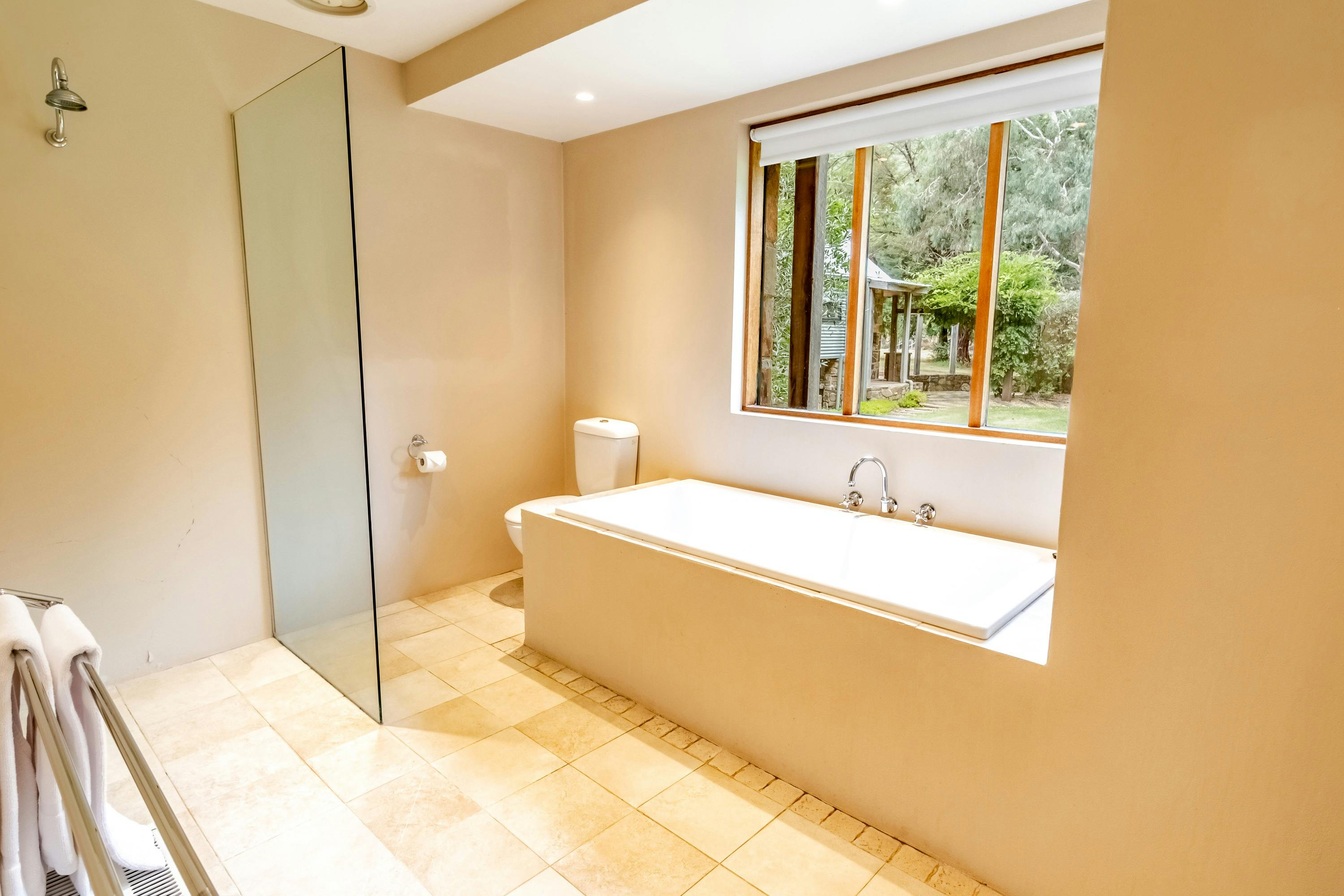 Bathroom with soaking bath tub