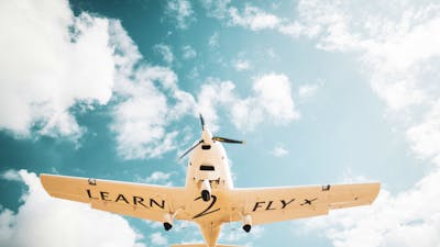 Learn2Fly aircraft photo from below pictured coming into land