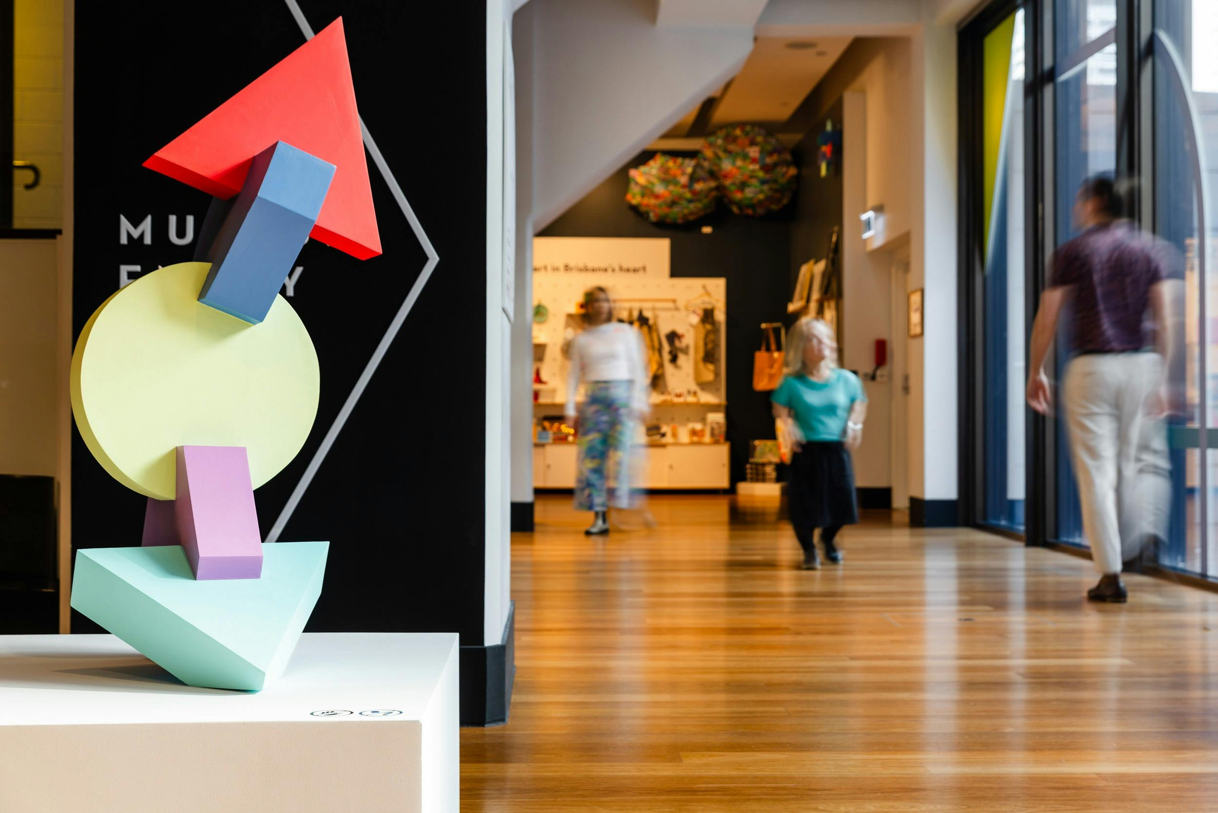 The entrance to Museum of Brisbane's shop, featuring a geometric sculpture by Renee Kire.