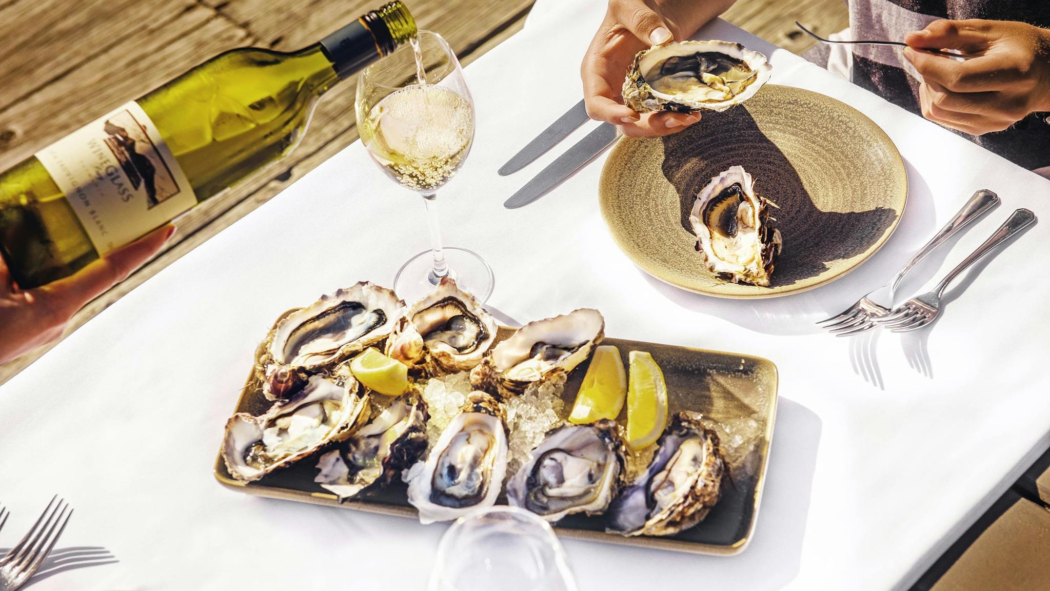 and wine on the jetty at Freycinet Lodge