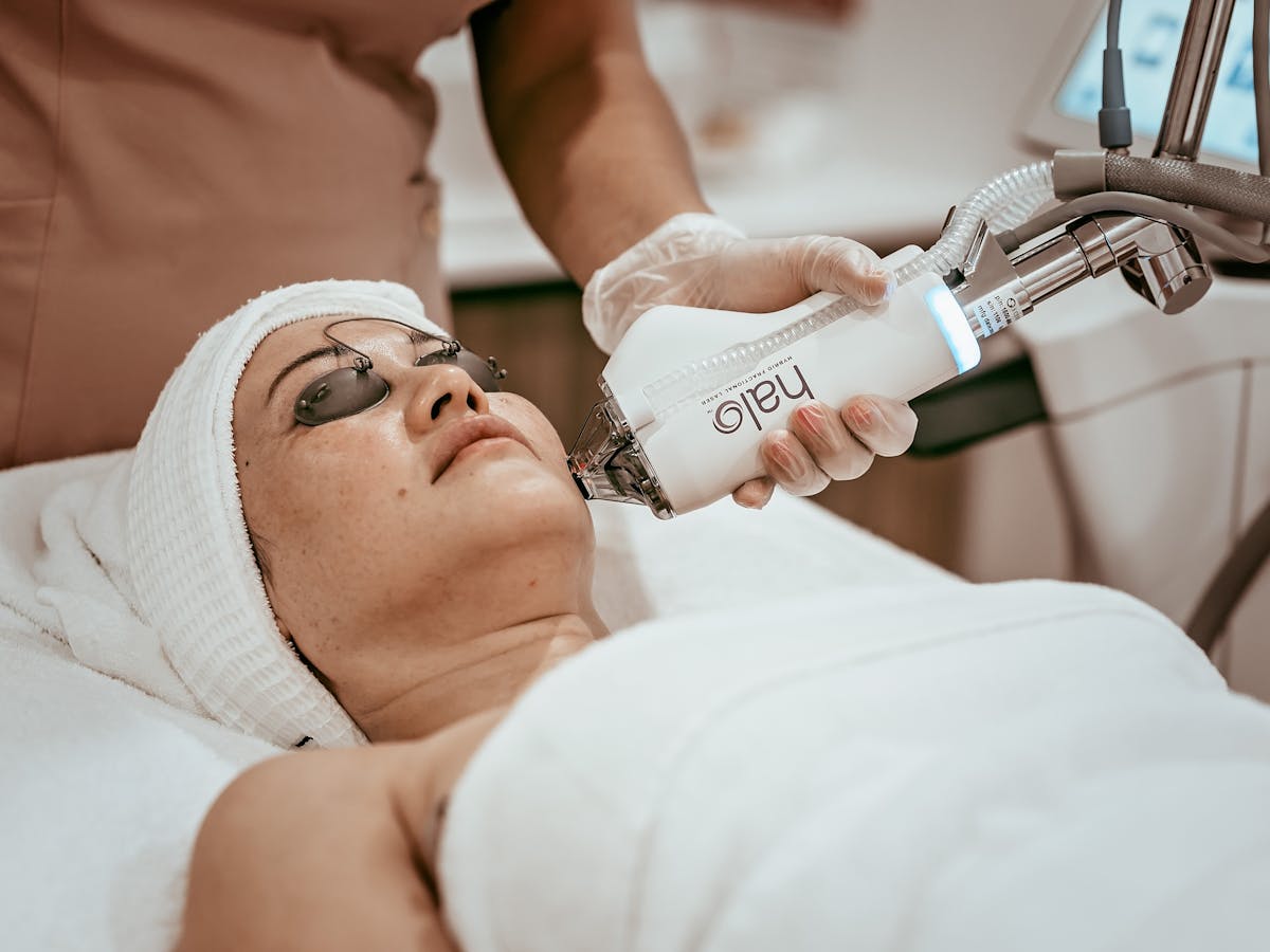 A patient getting laser done at SunCoast Skin