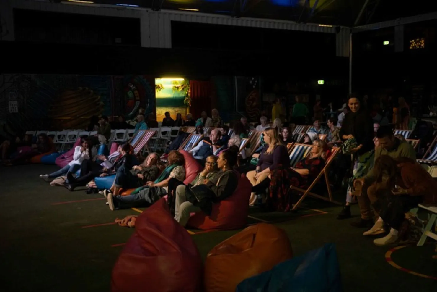 A group of people sitting in chairs