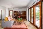 Lounge area, bookshelf, garden view