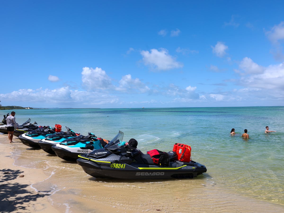 Tour group having a break and swim at Moreton Island