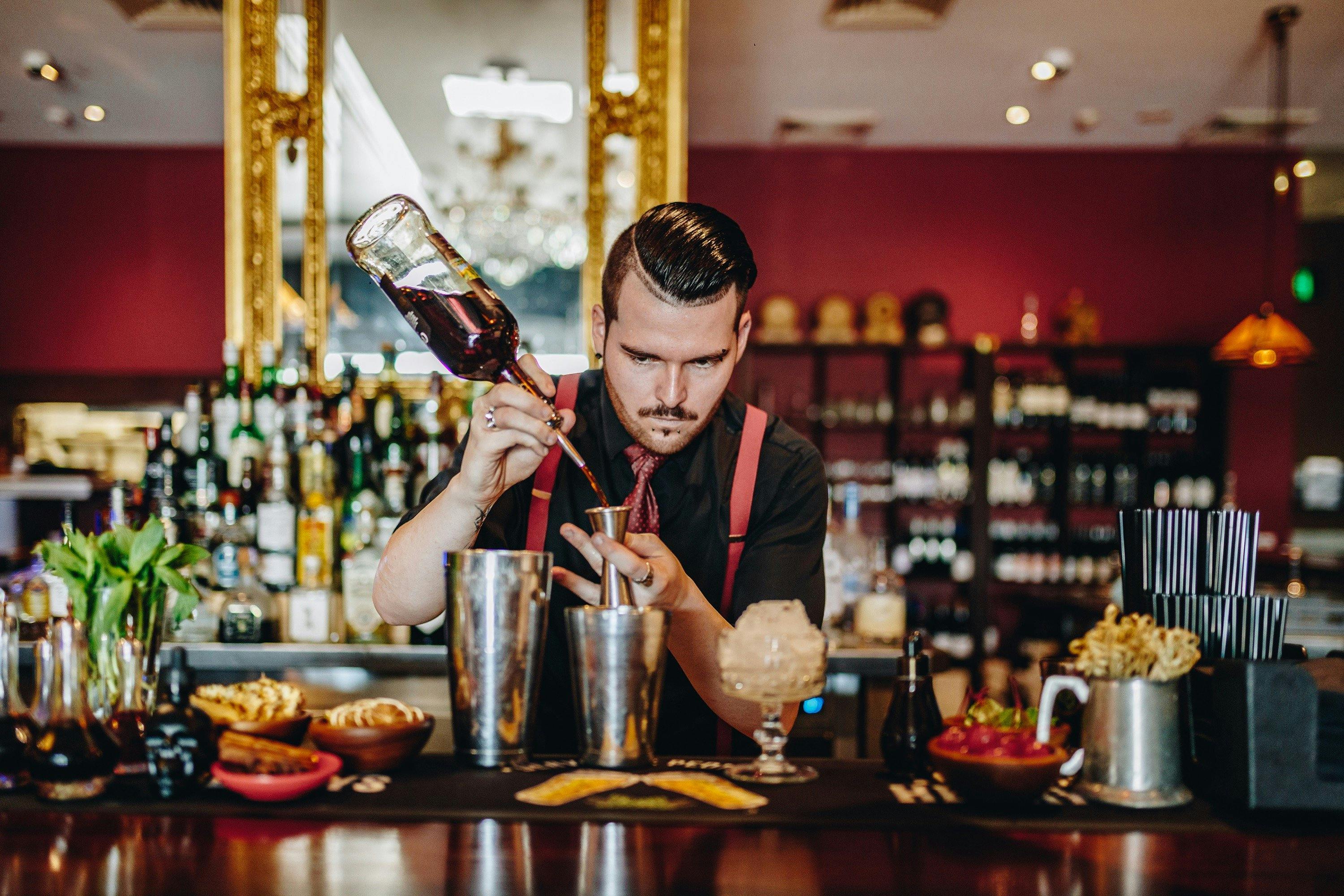 Head Bar manager Brodie making cocktails at Goldfish Bar and Restaurant Roche Estate