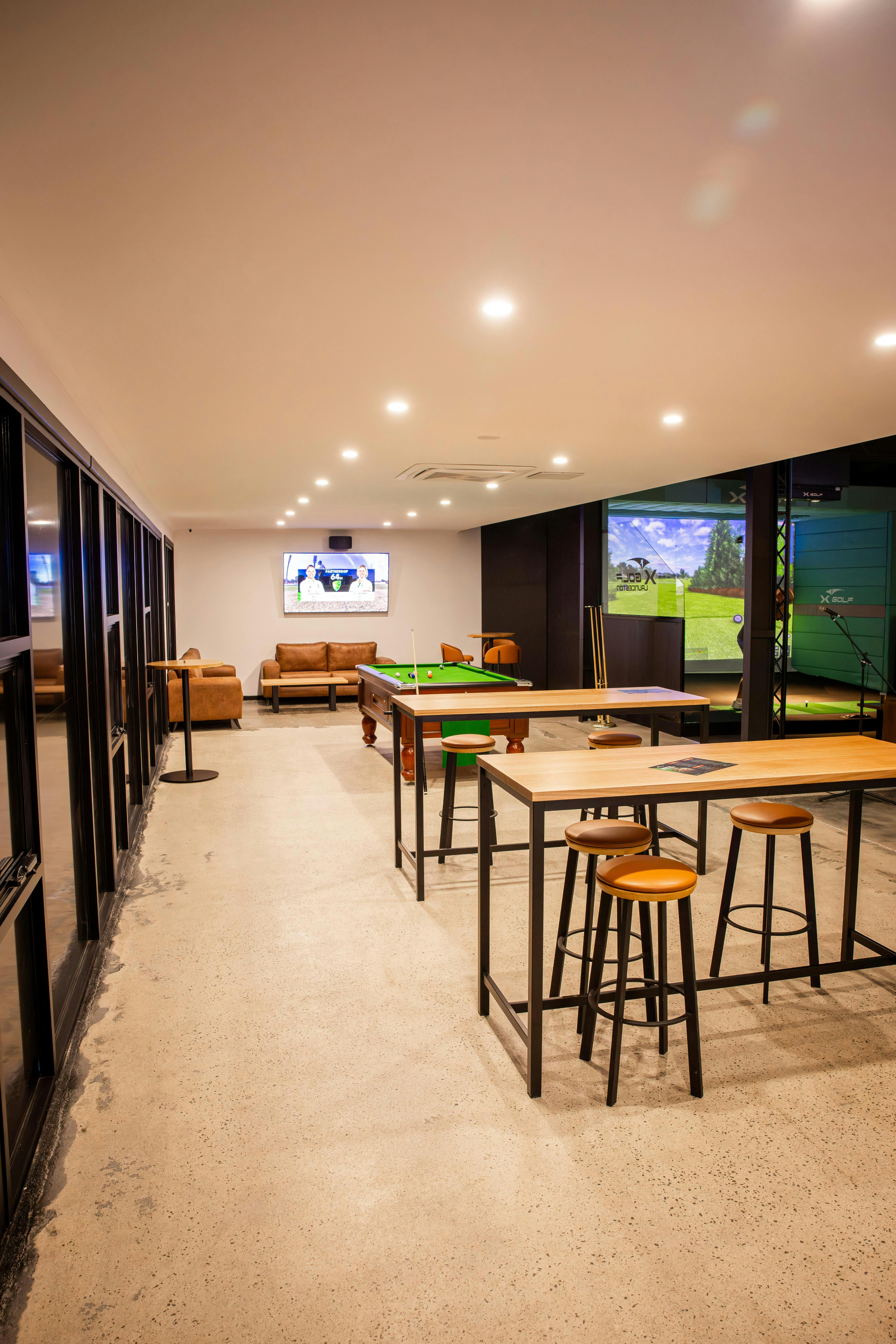 Pool Table and Lounge Area at X-Golf Launceston