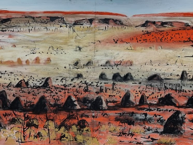 This image is of a red abstract landscape with dark shapes and textured sky.  Ink and pastel used.