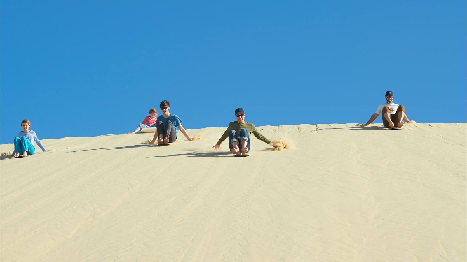 Sandboarding Stockton beach   4WD Tours R US