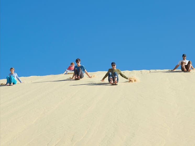 Sandboarding Stockton beach   4WD Tours R US