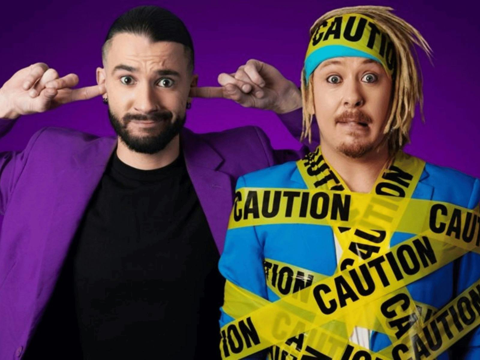 two men standing next to each other pulling silly faces