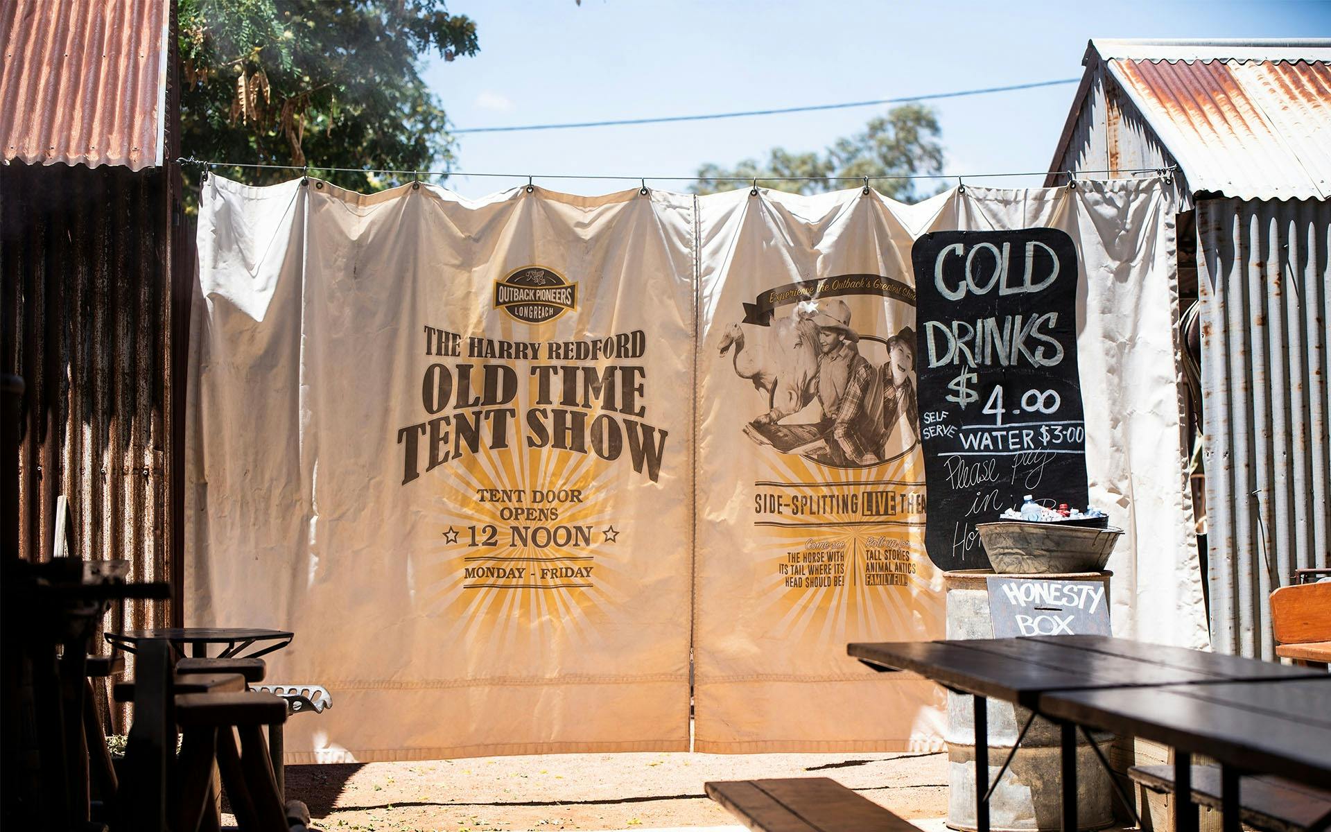 Old Time Tent Show canvas curtains pulled closed, waiting for the performance to start